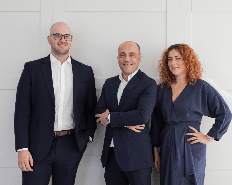 A2CO Legal Department, showing Partner Oliver Zammit, Legal Counsel Demis Buttigieg and General Counsel Alexandra Dimech.