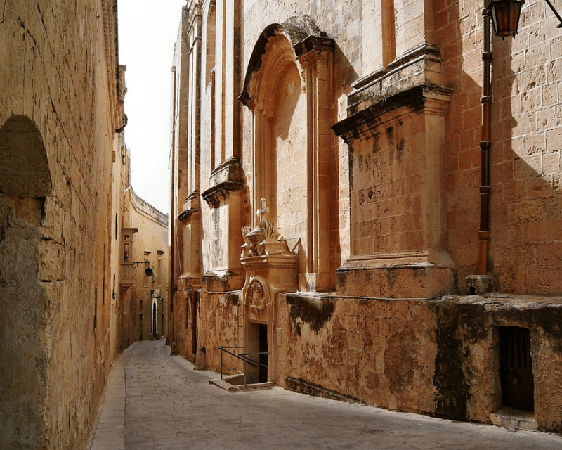 Mdina streets symbolising Malta’s historic roots and A2CO’s local expertise.