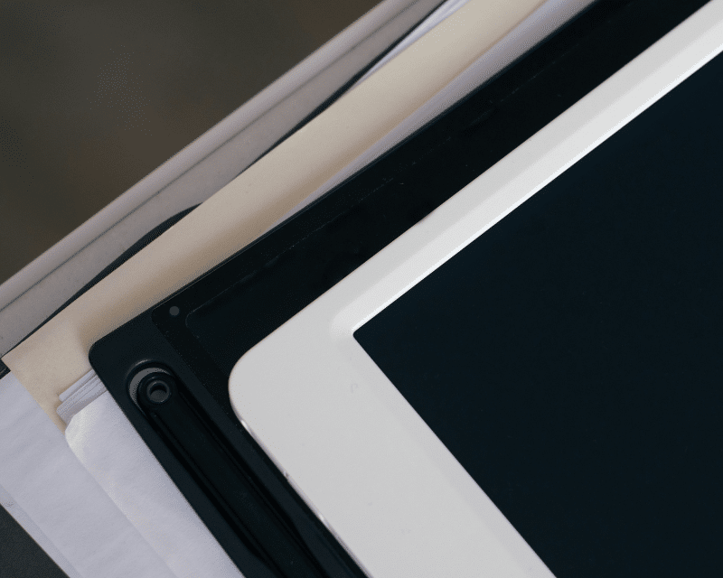 A2CO consultant reviewing and signing compliance documents.