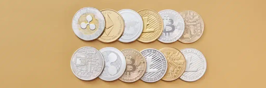 MiCA utility token concept image showing various cryptocurrency coins representing digital assets subject to EU MiCA regulation and token issuance requirements